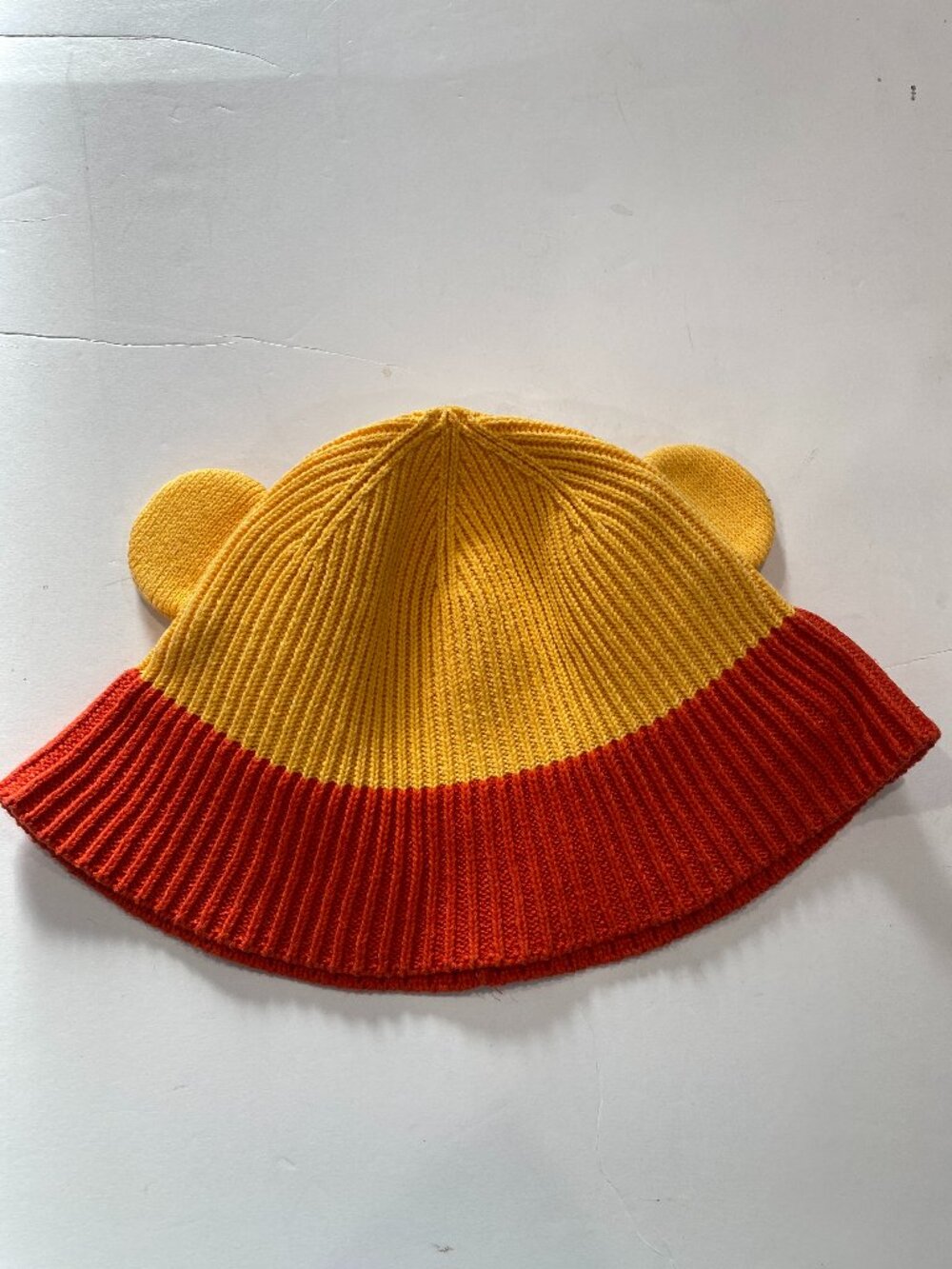 Disney, Winnie the Pooh, knit bucket hat for adults, OSFM. Yellow/orange w/ears.